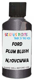 Detail brush applying Purple Metallic to a small door scratch on an Ford Transit, clean OEM finish