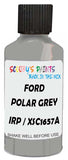 Detail brush applying Grey Solid to a small door scratch on an Ford Osi, clean OEM finish