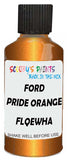 Detail brush applying Orange Metallic to a small door scratch on an Ford Ranger, clean OEM finish