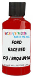 Detail brush applying Red Solid to a small door scratch on an Ford Ecosport, clean OEM finish