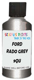 Detail brush applying Grey Metallic to a small door scratch on an Ford Fiesta, clean OEM finish