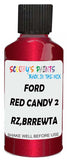 Detail brush applying Red Metallic to a small door scratch on an Ford Fiesta, clean OEM finish
