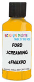 Detail brush applying Yellow Solid to a small door scratch on an Ford Edge Ranger, clean OEM finish
