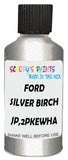 Detail brush applying Silver Metallic to a small door scratch on an Ford Excursion, clean OEM finish