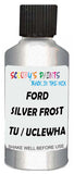 Detail brush applying Silver Metallic to a small door scratch on an Ford Probe, clean OEM finish