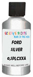 Detail brush applying Silver Metallic to a small door scratch on an Ford Heavy Truck, clean OEM finish