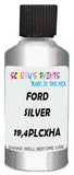 Detail brush applying Silver Metallic to a small door scratch on an Ford F-Series, clean OEM finish