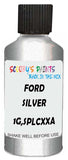 Detail brush applying Silver Metallic to a small door scratch on an Ford Maverick, clean OEM finish