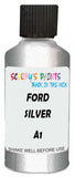 Detail brush applying Silver Metallic to a small door scratch on an Ford Festiva, clean OEM finish