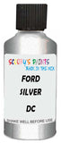 Detail brush applying Silver Metallic to a small door scratch on an Ford Courier, clean OEM finish