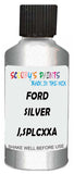 Detail brush applying Silver Metallic to a small door scratch on an Ford F-Series, clean OEM finish