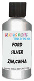 Detail brush applying Silver Metallic to a small door scratch on an Ford Econoline, clean OEM finish