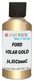 Detail brush applying Gold Metallic to a small door scratch on an Ford Transit, clean OEM finish