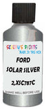 Detail brush applying Silver Metallic to a small door scratch on an Ford Transit, clean OEM finish