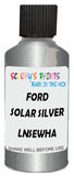 Detail brush applying Silver Metallic to a small door scratch on an Ford Puma, clean OEM finish