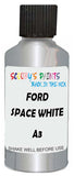 Detail brush applying White Metallic to a small door scratch on an Ford F-Series Lariat, clean OEM finish