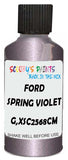 Detail brush applying Purple Metallic to a small door scratch on an Ford Escort, clean OEM finish