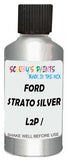 Detail brush applying Grey Metallic to a small door scratch on an Ford Osi, clean OEM finish