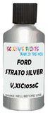 Detail brush applying Grey Metallic to a small door scratch on an Ford Orion, clean OEM finish