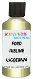 Detail brush applying Green Metallic to a small door scratch on an Ford Fiesta, clean OEM finish