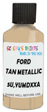 Detail brush applying Beige Solid to a small door scratch on an Ford Mustang, clean OEM finish