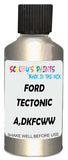 Detail brush applying Silver Metallic to a small door scratch on an Ford Focus, clean OEM finish