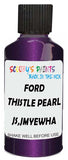Detail brush applying Purple Metallic to a small door scratch on an Ford Econoline, clean OEM finish