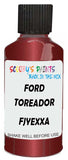 Detail brush applying Red Metallic to a small door scratch on an Ford F-Series, clean OEM finish