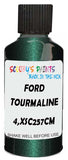 Detail brush applying Green Metallic to a small door scratch on an Ford Fiesta, clean OEM finish