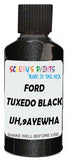 Detail brush applying Black Metallic to a small door scratch on an Ford Edge, clean OEM finish