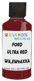 Detail brush applying Red Solid to a small door scratch on an Ford F-Series, clean OEM finish