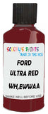 Detail brush applying Red Solid to a small door scratch on an Ford Taurus, clean OEM finish