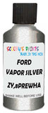 Detail brush applying Silver Metallic to a small door scratch on an Ford Expedition, clean OEM finish
