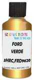 Detail brush applying Gold Metallic to a small door scratch on an Ford Focus, clean OEM finish