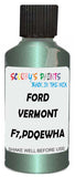 Detail brush applying Green Metallic to a small door scratch on an Ford Bronco, clean OEM finish