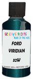 Detail brush applying Green Metallic to a small door scratch on an Ford Ranger, clean OEM finish