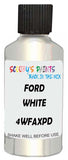 Detail brush applying White Metallic to a small door scratch on an Ford Expedition Eddie Bauer, clean OEM finish