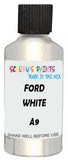 Detail brush applying White Metallic to a small door scratch on an Ford Festiva, clean OEM finish