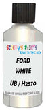 Detail brush applying White Metallic to a small door scratch on an Ford Festiva, clean OEM finish