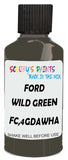 Detail brush applying Green Solid to a small door scratch on an Ford Expedition, clean OEM finish