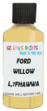 Detail brush applying Yellow Solid to a small door scratch on an Ford Fiesta, clean OEM finish
