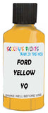 Detail brush applying Yellow Solid to a small door scratch on an Ford Courier, clean OEM finish