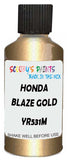 Detail brush applying Gold Metallic to a small door scratch on an Honda Accord Wagon, clean OEM finish