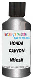 Detail brush applying Grey Metallic to a small door scratch on an Honda Lagreat, clean OEM finish