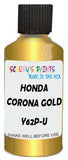 Detail brush applying Gold Metallic to a small door scratch on an Honda Civic, clean OEM finish