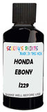 Detail brush applying Black Solid to a small door scratch on an Honda Cr-V, clean OEM finish