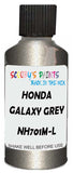 Detail brush applying Grey Metallic to a small door scratch on an Honda Element, clean OEM finish