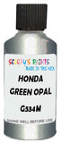 Detail brush applying Green Metallic to a small door scratch on an Honda Civic Hybrid, clean OEM finish