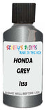 Detail brush applying Grey Metallic to a small door scratch on an Honda Element, clean OEM finish