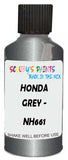 Detail brush applying Grey Metallic to a small door scratch on an Honda Element, clean OEM finish